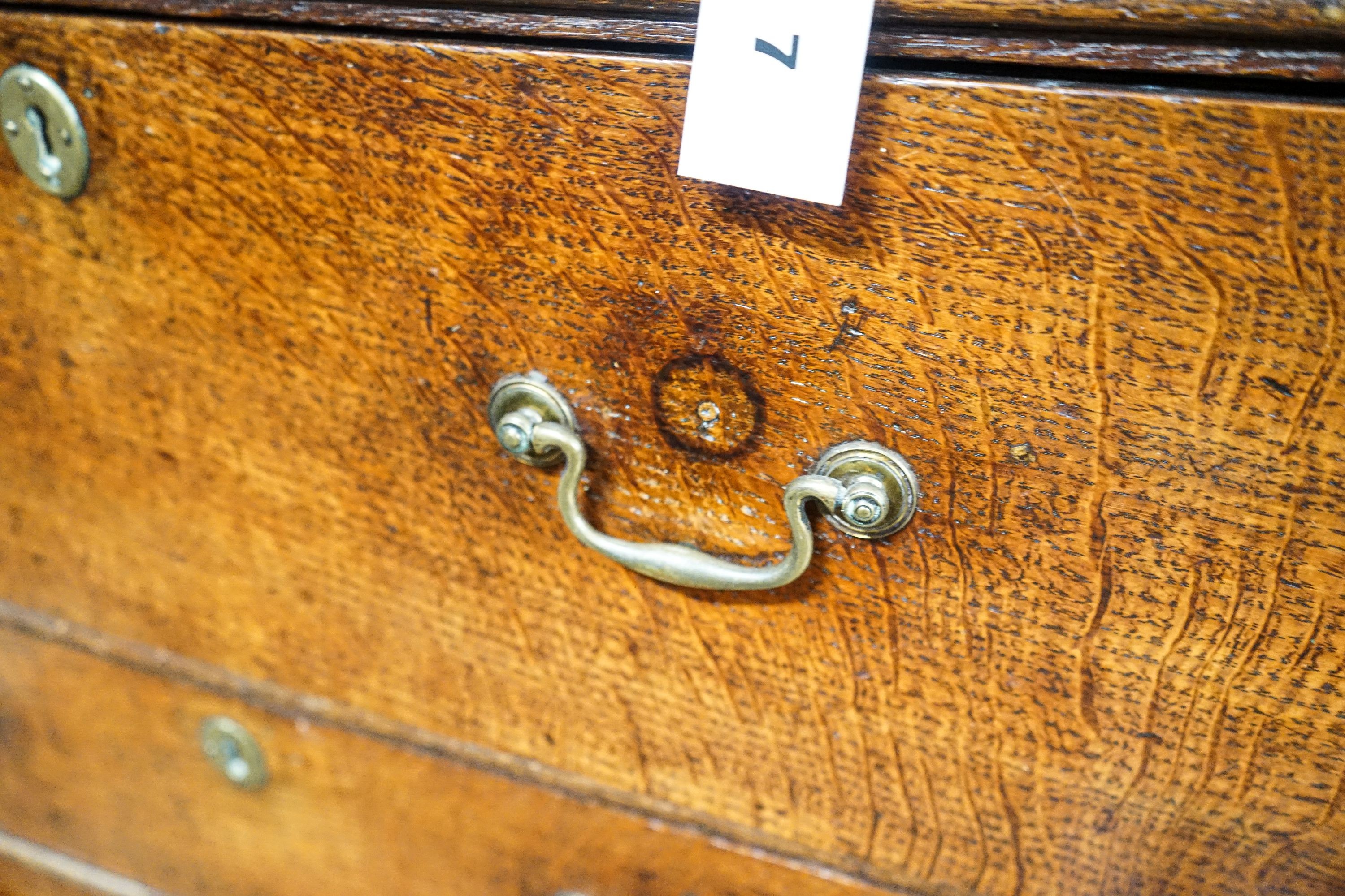 A George III oak chest of five drawers, on bracket feet, width 90cm, depth 52cm, height 103cm